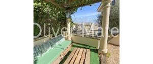 VIVIENDA CON TERRAZA, JARDÍN, SOLARIUM Y VISTAS AL MAR